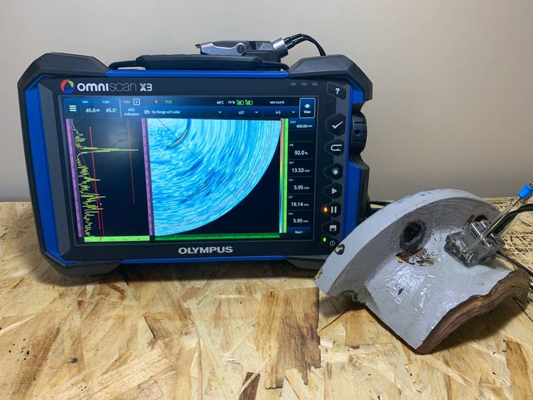 OmniScan X3 phased array device and a dual matrix array probe on an FRP flange from an ammonia scrubber