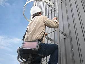 Climbing a Tower with a Videoscope Slung over Shoulder