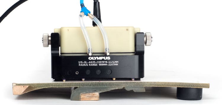 1 MHz low-frequency phased array probe in AQ25 Aqualene holder on a composite wind turbine blade sample