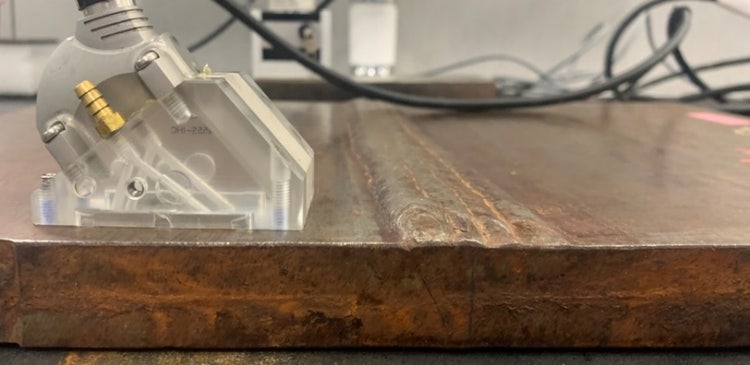 A clear plastic object on a wooden surface AI-generated content may be incorrect.