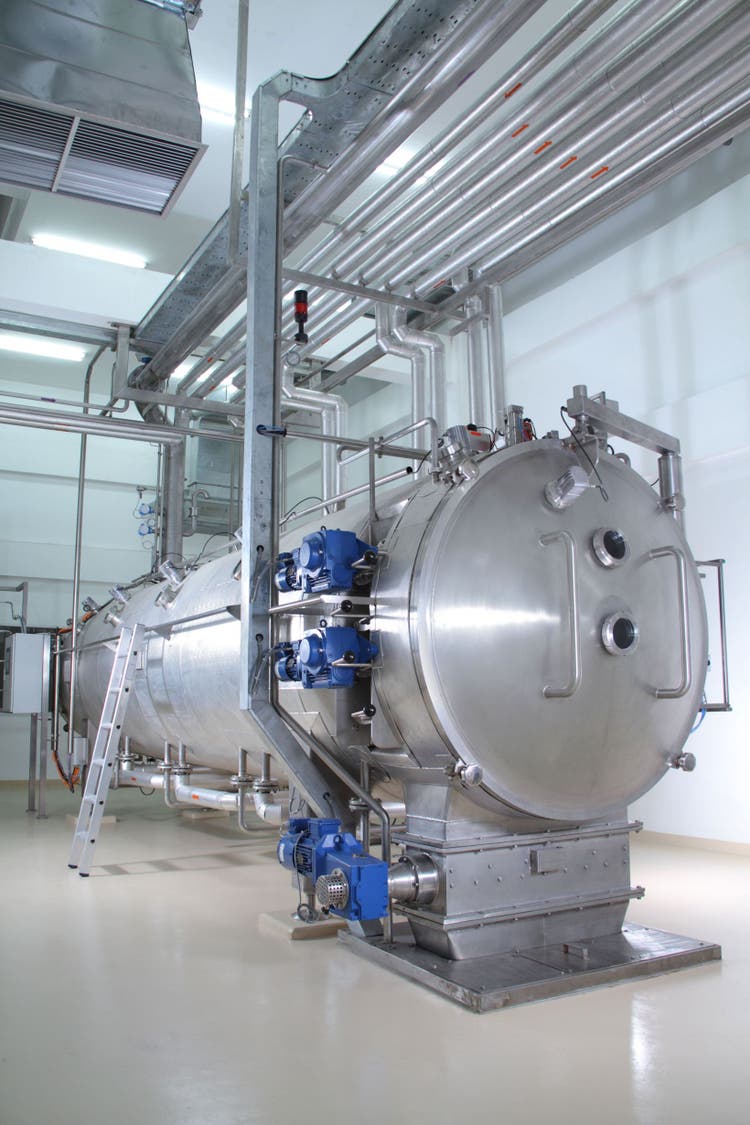 Pharmaceutical plant with a drug production tanks and several stainless steel processing pipes