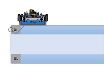 Phrased array probe and water wedge assembly of an automated tube inspection system near the tube end with the beam reflecting off the pipe edge