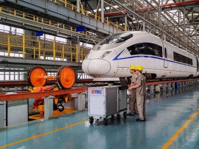 Train undergoing maintenance inspection in a DTEC GmbH inspection depot