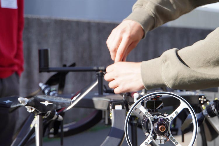 Worker dismantling a drone