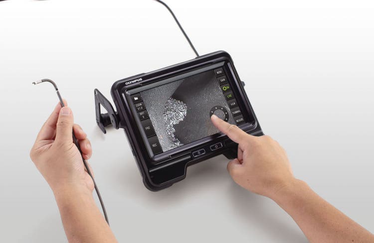 Weld inspector using an Olympus IPLEX series videoscope’s touch screen to control the responsive scope tip TrueFeel articulation