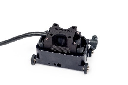 A black device with a cable Description automatically generated