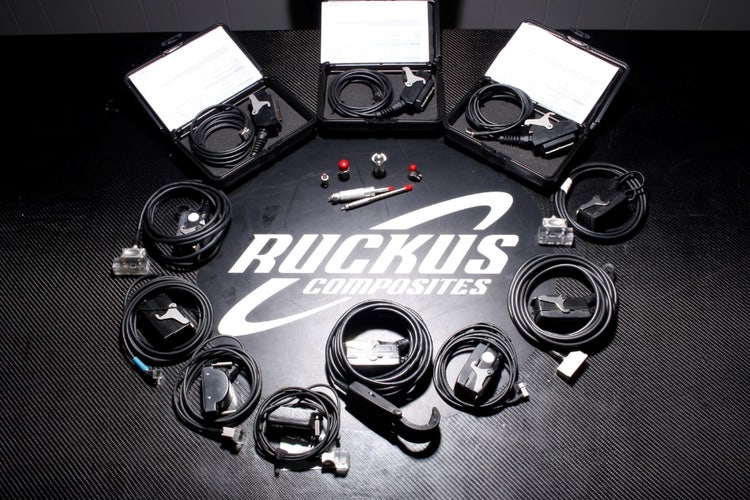 A group of cables and wires on a table Description automatically generated