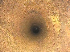 Inspección videoscópica en un tubo de refrigeración corroído