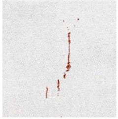 Part inspected with Penetrant Testing (visible red dye)