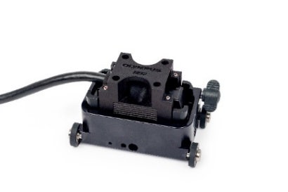 A black device with a cable Description automatically generated