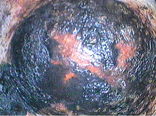 Internal borescope photo showing process pipe.