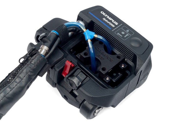 A black device with a cable Description automatically generated with medium confidence