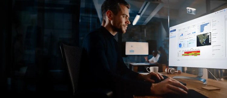 A person sitting at a desk AI-generated content may be incorrect.